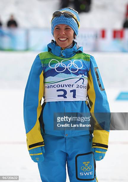 Charlotte Kalla of Sweden wins the gold medal in the Cross-Country Skiing Ladies' 10 km Free on day 4 of the 2010 Winter Olympics at Whistler Olympic...