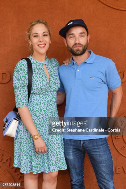 Actors Alysson Paradis and Guillaume Gouix attend the 2018 French Open - Day Nine at Roland Garros on June 4, 2018 in Paris, France.