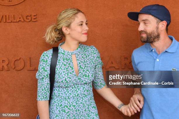 Actors Alysson Paradis and Guillaume Gouix attend the 2018 French Open - Day Nine at Roland Garros on June 4, 2018 in Paris, France.
