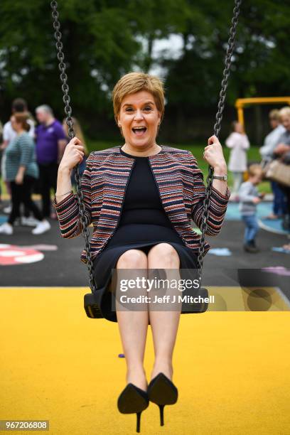 First Minister Nicola Sturgeon sits on a swing as she officially opens Play as One Scotland's fully inclusive play park on June 4, 2018 in...