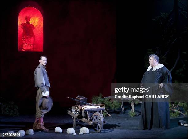 Loic Corbery and Serge Bagdassarian from The Comedie Francaise troupe perform "Dom Juan ou le Festin de Pierre" of Moliere on September 14, 2012 in...