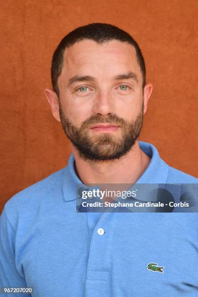 Actor Guillaume Gouix attends the 2018 French Open - Day Nine at Roland Garros on June 4, 2018 in Paris, France.