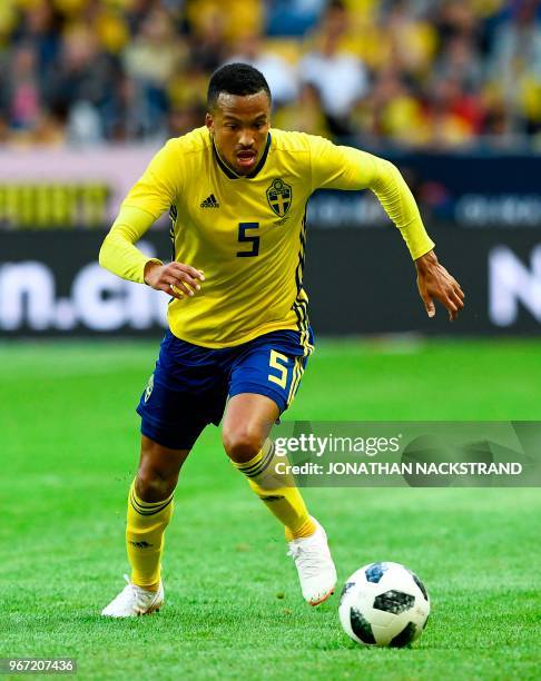 Sweden's defender Martin Olsson controls the ball during the international friendly footbal match Sweden v Denmark in Solna, Sweden on June 2, 2018.