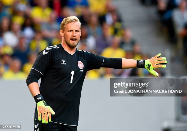 Denmark's goalkeeper Kasper Schmeichel reacts during the international friendly footbal match Sweden v Denmark in Solna, Sweden on June 2, 2018.