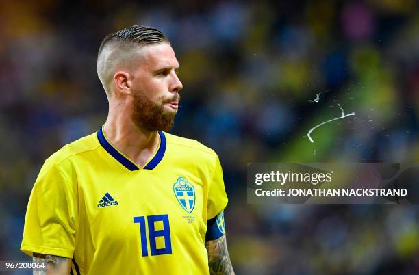 Sweden's defender Pontus Jansson reacts during the international friendly footbal match Sweden v Denmark in Solna, Sweden on June 2, 2018.