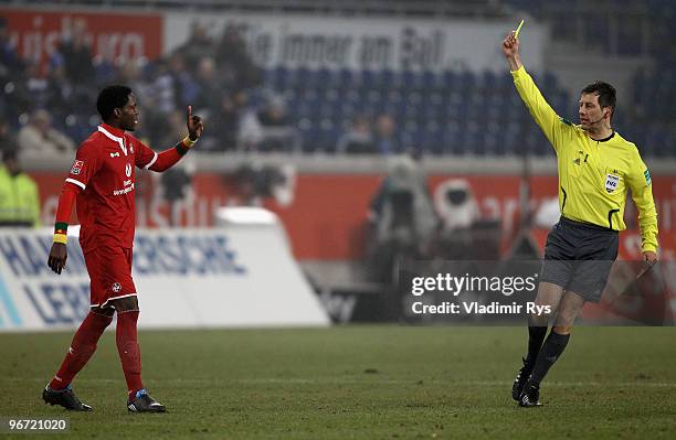 Georges Mandjeck of Kaiserslautern reacts after his booking by a yellow card from referee Wolfgang Stark during the Second Bundesliga match between...