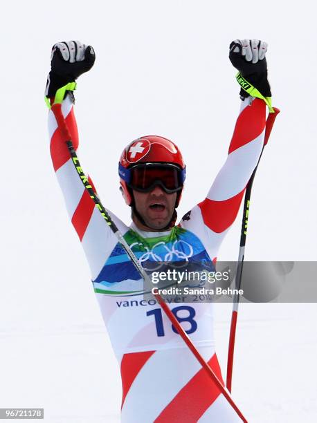 Didier Defago of Switzerland reacts after competing in the Alpine skiing Men's Downhill at Whistler Creekside during the Vancouver 2010 Winter...