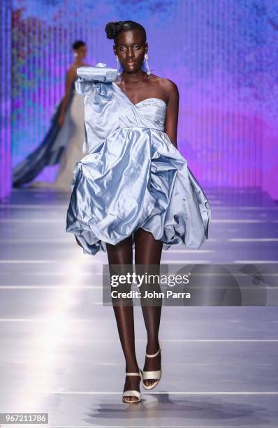 Model walk the runway during Miami Fashion Week 2018 - Angel Sanchez - Runway at Ice Palace on June 3, 2018 in Miami, Florida.