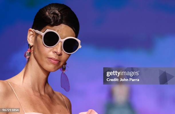 Model walk the runway during Miami Fashion Week 2018 - Angel Sanchez - Runway at Ice Palace on June 3, 2018 in Miami, Florida.