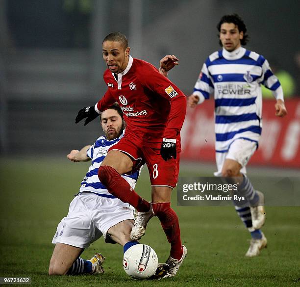 Sidney Sam of Kaiserslautern attacks defended by Olivier Veigneau of Duisburg during the Second Bundesliga match between MSV Duisburg and 1. FC...