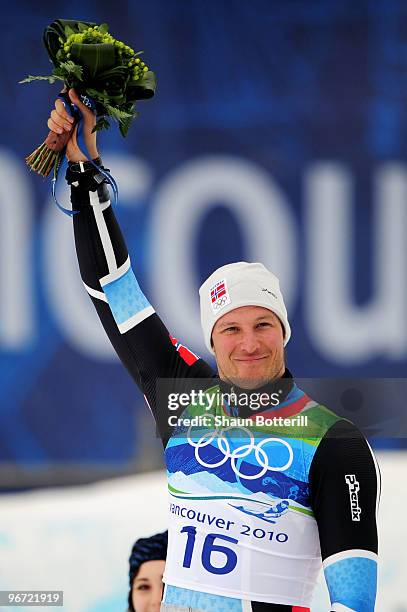 Aksel Lund Svindal of Norway celebrates after taking the silver in Alpine skiing Men's Downhill at Whistler Creekside during the Vancouver 2010...