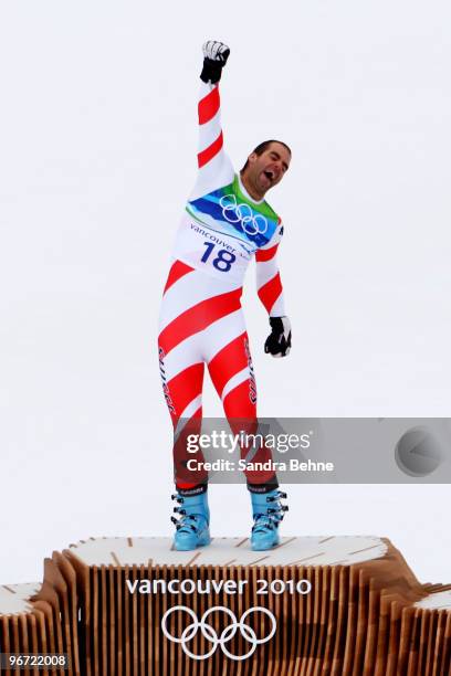 Didier Defago of Switzerland celebrates after taking gold in the Alpine skiing Men's Downhill at Whistler Creekside during the Vancouver 2010 Winter...