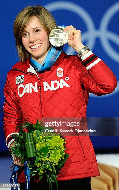 Jennifer Heil of Canada celebrates with her silver medal during the medal ceremony for the Ladies Moguls final Medal ceremony on day 3 of the...