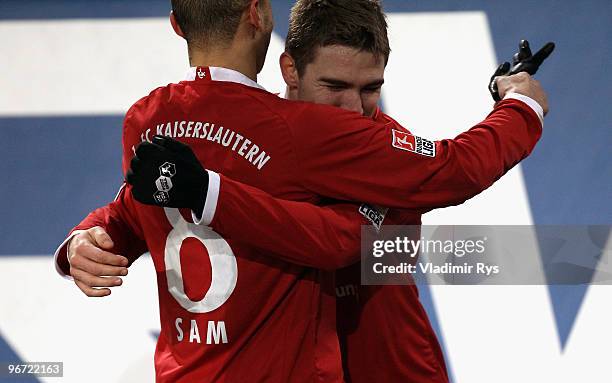 Erik Jendrisek of Kaiserslautern celebrates with his team mate Sidney Sam after scoring his team's first goal during the Second Bundesliga match...