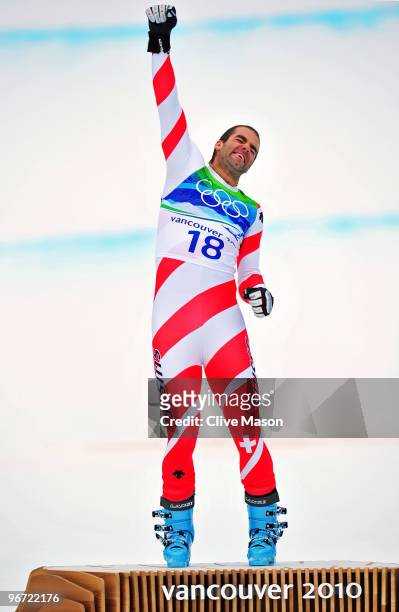 Didier Defago of Switzerland celebrates after taking gold in the Alpine skiing Men's Downhill at Whistler Creekside during the Vancouver 2010 Winter...