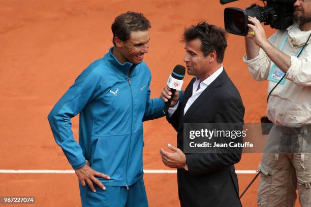 Rafael Nadal of Spain is interviewed by Fabrice Santoro during Day 9 of the 2018 French Open at Roland Garros stadium on June 4, 2018 in Paris,...