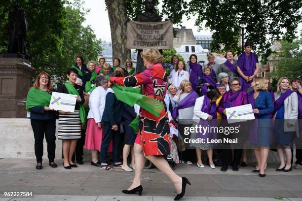 Minister for Energy and Climate Change Andrea Leadsom arrives before posing with other female MPs to promote the "Processions" march during a...