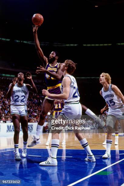 James Worthy of the Los Angeles Lakers goes to the basket against the Dallas Mavericks circa 1986 at Reunion Arena in Dallas, Texas. NOTE TO USER:...