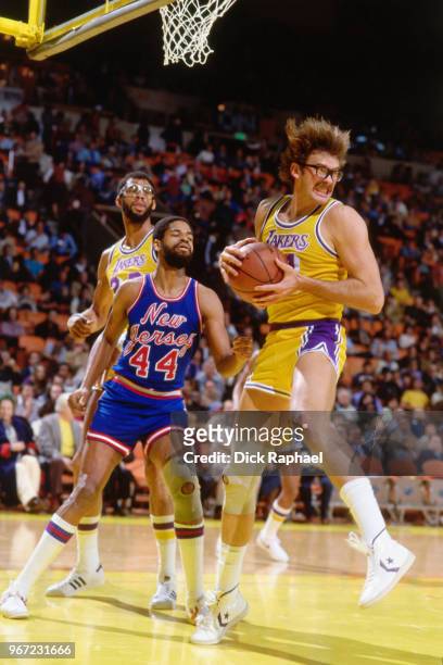 Kurt Rambis of the Los Angeles Lakers grabs the rebound against the New Jersey Nets circa 1986 at The Forum in Inglewood, California. NOTE TO USER:...