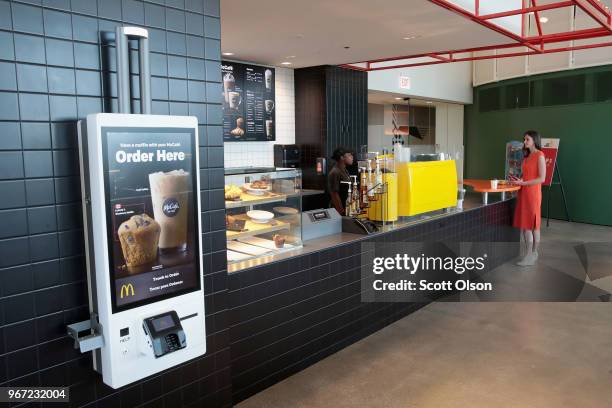An employee orders a beverage in the Work Cafe area inside of McDonald's new corporate headquarters on June 4, 2018 in Chicago, Illinois. McDonald's...