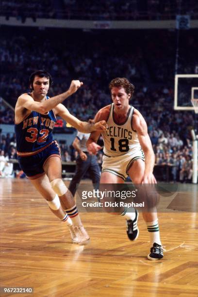Dave Cowens of the Boston Celtics handles the ball against the New York Knicks circa 1974 at the Boston Garden in Boston, Massachusetts. NOTE TO...