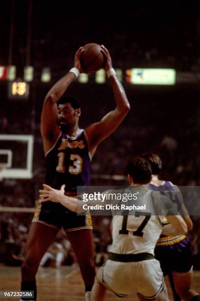 Wilt Chamberlain of the Los Angeles Lakers handles the ball against the Boston Celtics circa 1970 at the Boston Garden in Boston, Massachusetts. NOTE...