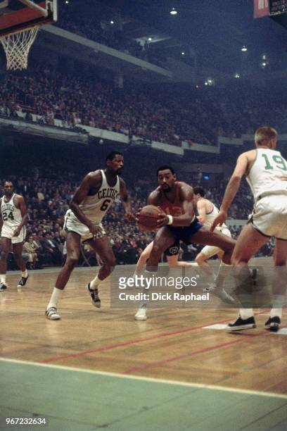 Wilt Chamberlain of the Philadelphia 76ers handles the ball against the Boston Celtics circa 1966 at the Boston Garden in Boston, Massachusetts. NOTE...