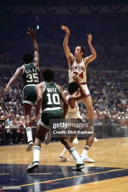 Bill Bradley of the New York Knicks shoots the ball against the Boston Celtics circa 1972 at Madison Square Garden in New York City, New York. NOTE...