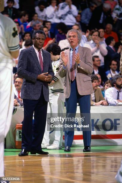 Head Coach K.C Jones and Assistant Coach Jimmy Rodgers of the Boston Celtics look on during the game against the Atlanta Hawks circa 1988 at the...