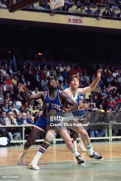 Willis Reed of the New York Knicks boxes out Dave Cowens of the Boston Celtics circa 1974 at the Boston Garden in Boston, Massachusetts. NOTE TO...