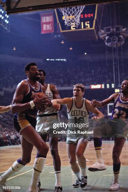 Wilt Chamberlain of the Los Angeles Lakers handles the ball against the Boston Celtics circa 1968 at the Boston Garden in Boston, Massachusetts. NOTE...