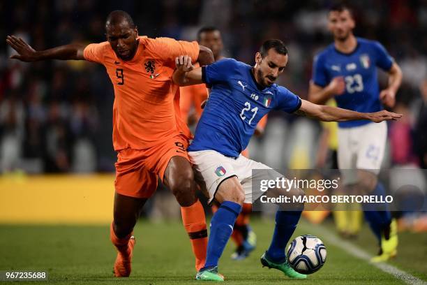 Netherlands National team forward Ryan Babel fights for the ball with Italy's national team midfielder Davide Zappacosta during the international...