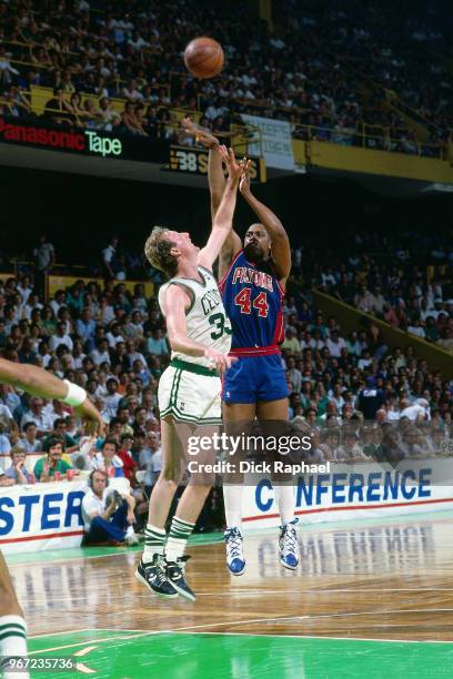 Rick Mahorn of the Detroit Pistons shoots the ball against the Boston Celtics circa 1986 at the Boston Garden in Boston, Massachusetts. NOTE TO USER:...