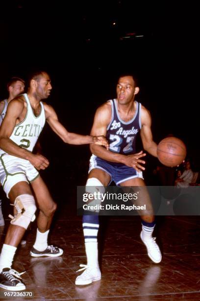 Elgin Baylor of the Los Angeles Lakers handles the ball against the Boston Celtics circa 1966 at the Boston Garden in Boston, Massachusetts. NOTE TO...