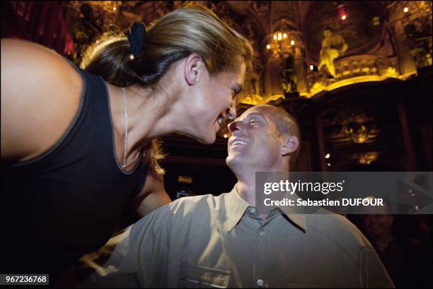 Amelie Mauresmo and her girlfriend discover the tennis player's wax likeness at the Musee Grevin.