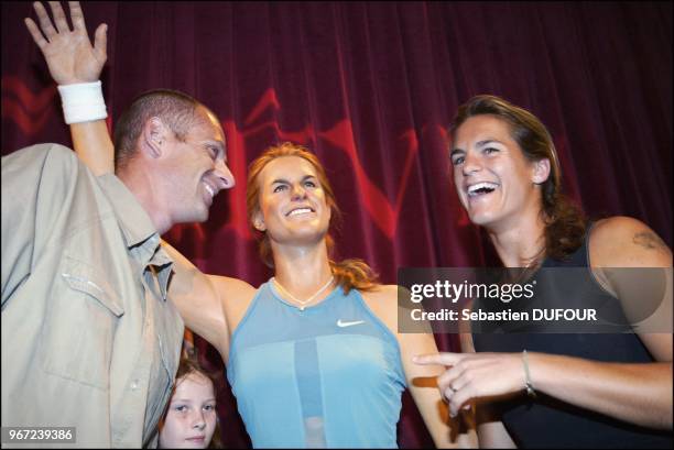 Amelie Mauresmo and her girlfriend discover the tennis player's wax likeness at the Musee Grevin.