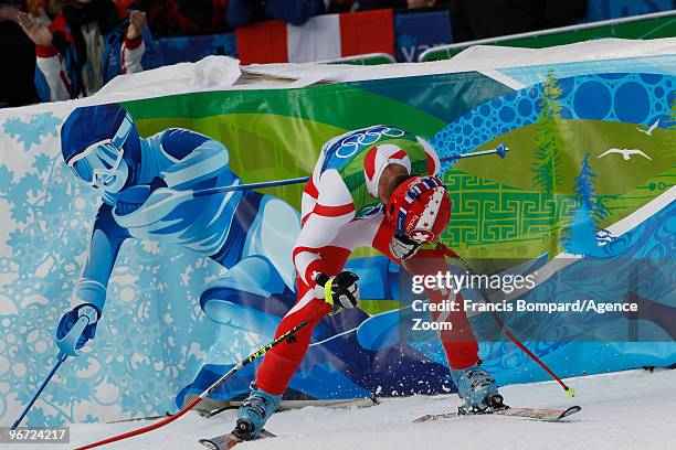 Didier Defago of Switzerland takes the Gold Medal during the Men's Alpine Skiing Downhill on Day 4 of the 2010 Vancouver Winter Olympic Games on...