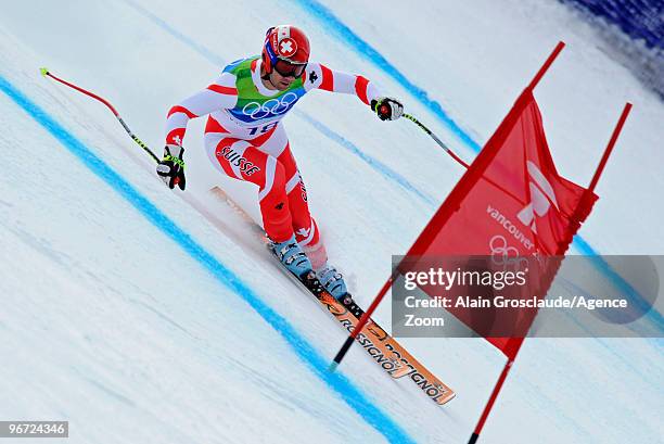 Didier Defago of Switzerland takes the Gold Medal during the Men's Alpine Skiing Downhill on Day 4 of the 2010 Vancouver Winter Olympic Games on...