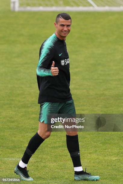 Portugal's forward Cristiano Ronaldo gestures during a training session at Cidade do Futebol training camp in Oeiras, outskirts of Lisbon, on June 4...