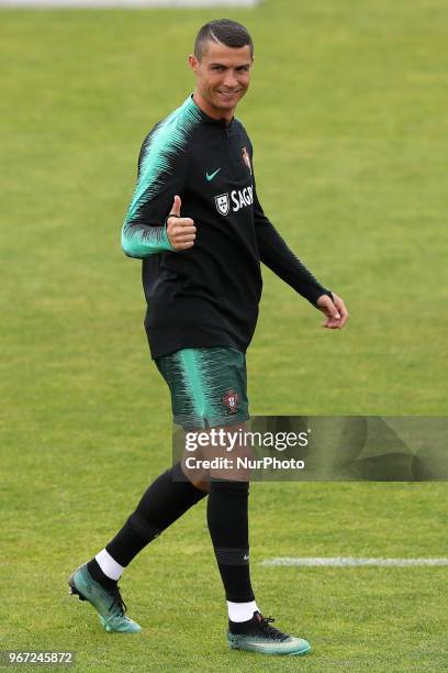 Portugal's forward Cristiano Ronaldo gestures during a training session at Cidade do Futebol training camp in Oeiras, outskirts of Lisbon, on June 4...