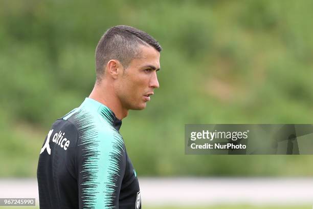 Portugal's forward Cristiano Ronaldo looks on during a training session at Cidade do Futebol training camp in Oeiras, outskirts of Lisbon, on June 4...
