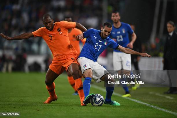 Davide Zappacosta of Italy competes for the ball with Ryan Babel of Netherlands during the International Friendly match between Italy and Netherlands...