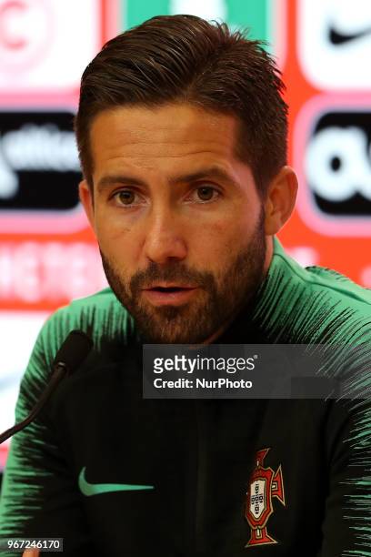 Portugal's midfielder Joao Moutinho attends a press conference before a training session at Cidade do Futebol training camp in Oeiras, outskirts of...