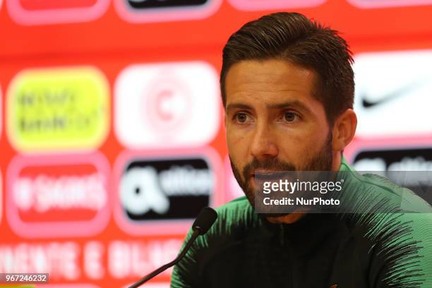Portugal's midfielder Joao Moutinho attends a press conference before a training session at Cidade do Futebol training camp in Oeiras, outskirts of...