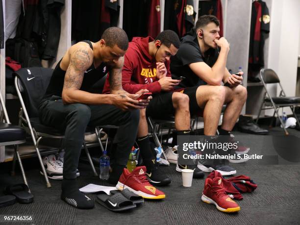 George Hill Jordan Clarkson and Ante Zizic of the Cleveland Cavaliers look on in the locker room prior to Game One of the 2018 NBA Finals against the...