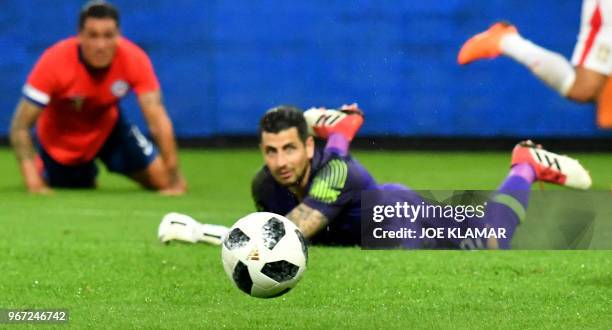 Chile's goalkeeper Gabriel Arias eyes the ball during the international friendly football match Serbia v Chile at the Merkur Arena in Graz, Austria...