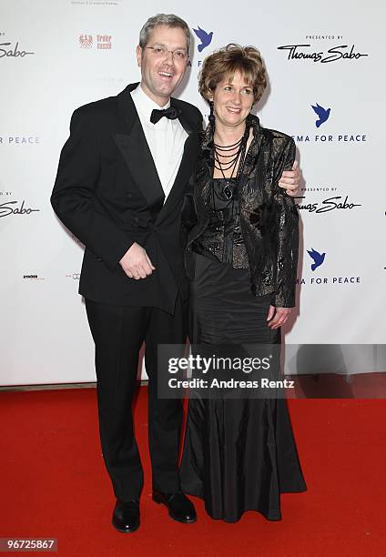 German Environment Minister Norbert Roettgen and his wife Ebba Herfs-Roettgen attend the Annual Cinema For Peace Gala during day five of the 60th...