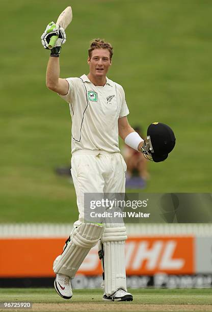 Martin Guptill of New Zealand celebrates his maiden test century during day two of the First Test match between New Zealand and Bangladesh at Seddon...