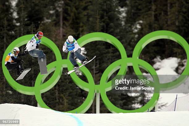 Lukas Gruener of Austria, Seth Wescott of the United States and Nate Holland of the United States compete against each other in semfinals heat during...