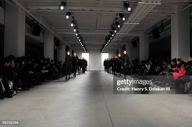 Models walk the runway at the runway at the Rad Hourani Fall/Winter 2010 fashion show at Milk Studios on February 15, 2010 in New York City.